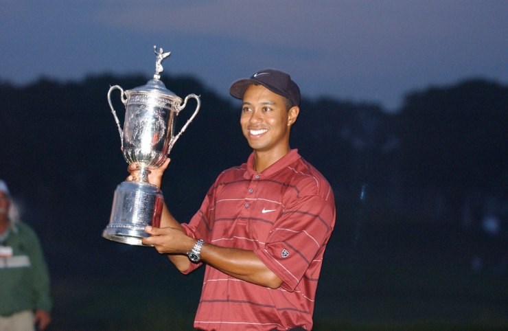 Figlio di Tiger Woods con trofeo